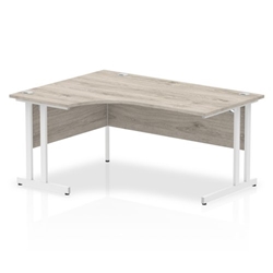 Impulse 1600mm Left Crescent Desk Grey Oak Top White Cantilever Leg