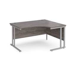 Maestro 25 right hand ergonomic desk 1400mm wide - silver cantilever leg frame, grey oak top