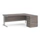 Maestro 25 right hand ergonomic desk 1800mm with silver cantilever frame and desk high pedestal - grey oak