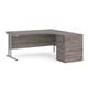 Maestro 25 right hand ergonomic desk 1600mm with silver cantilever frame and desk high pedestal - grey oak