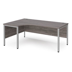 Maestro 25 left hand ergonomic desk 1800mm wide - silver bench leg frame, grey oak top