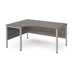 Maestro 25 left hand ergonomic desk 1600mm wide - silver bench leg frame, grey oak top